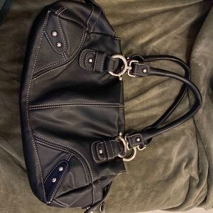 New bag. Use between 5-10 time. Visually brand new. All sales final.